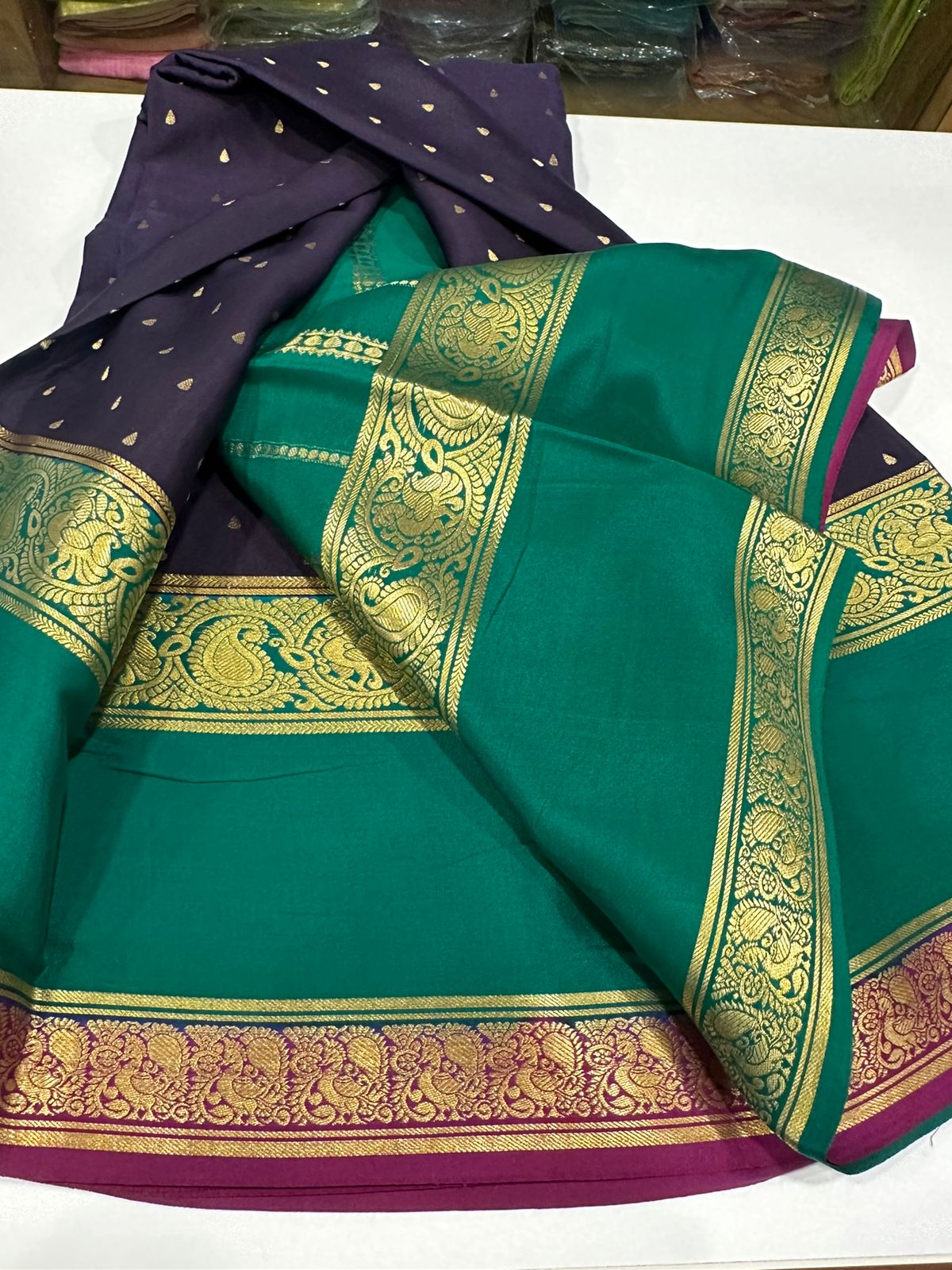 Pure Mysore silk sarees
120 grm thickness  with rich pallu 
Silk mark certified
Big mango n peacock design on border