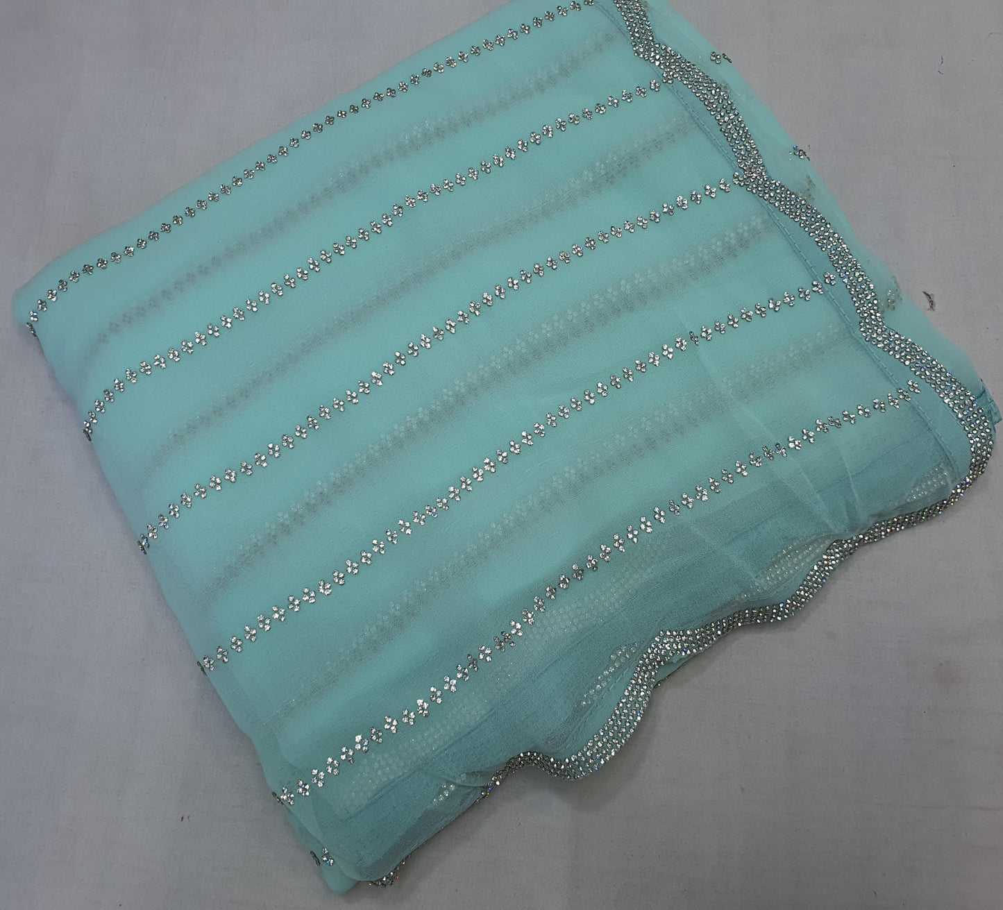 ALLOVER JARKAN STONE WORK AND BORDER ON PURE GEORGETTE*saree