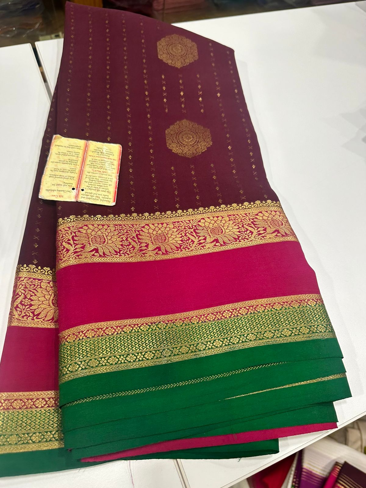 Pure Mysore silk sarees
120 grm thickness  with rich pallu 
Silk mark certified
Big Bentex border with motifs on the body n vertical lines   .....small motifs all over body with rich pallu