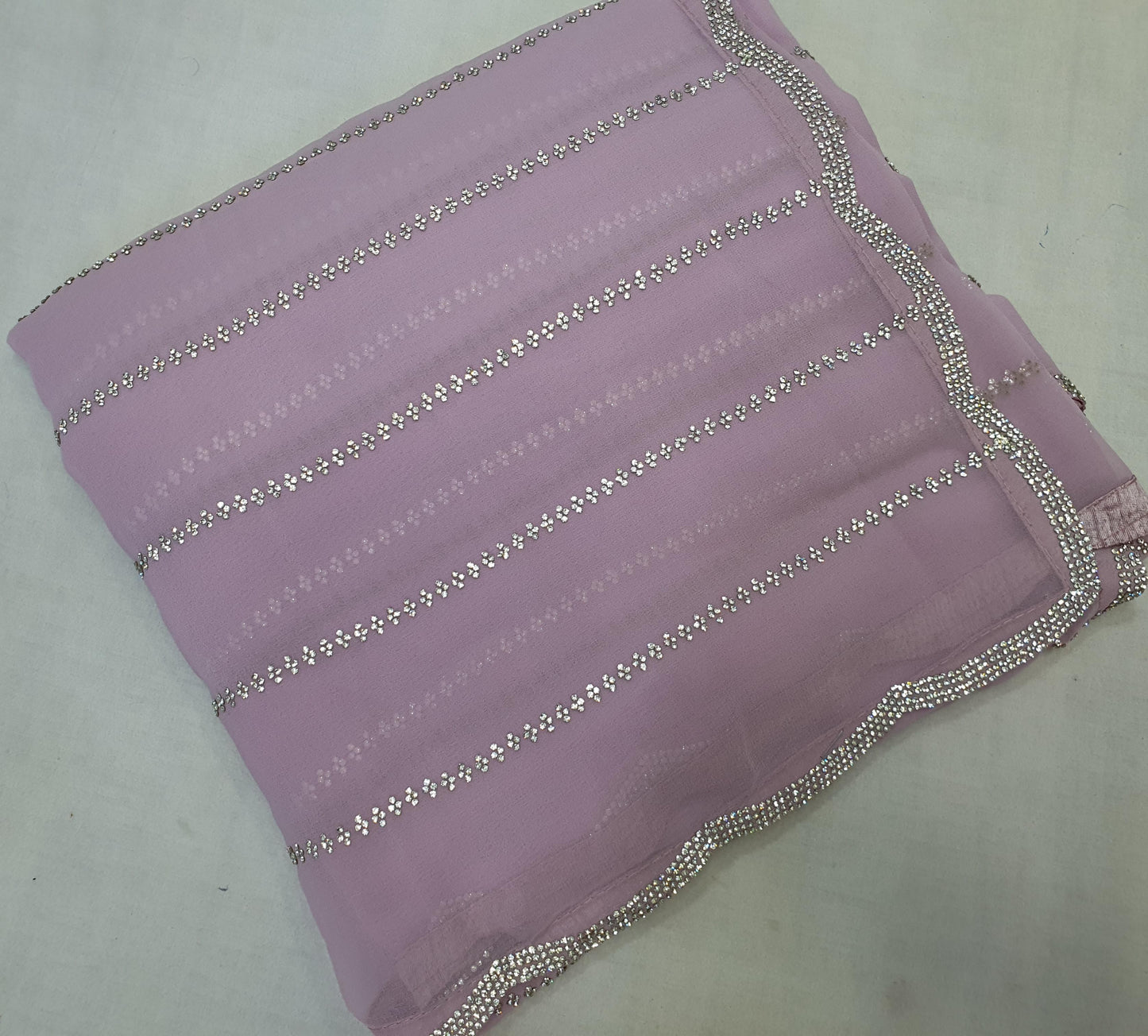 ALLOVER JARKAN STONE WORK AND BORDER ON PURE GEORGETTE*saree