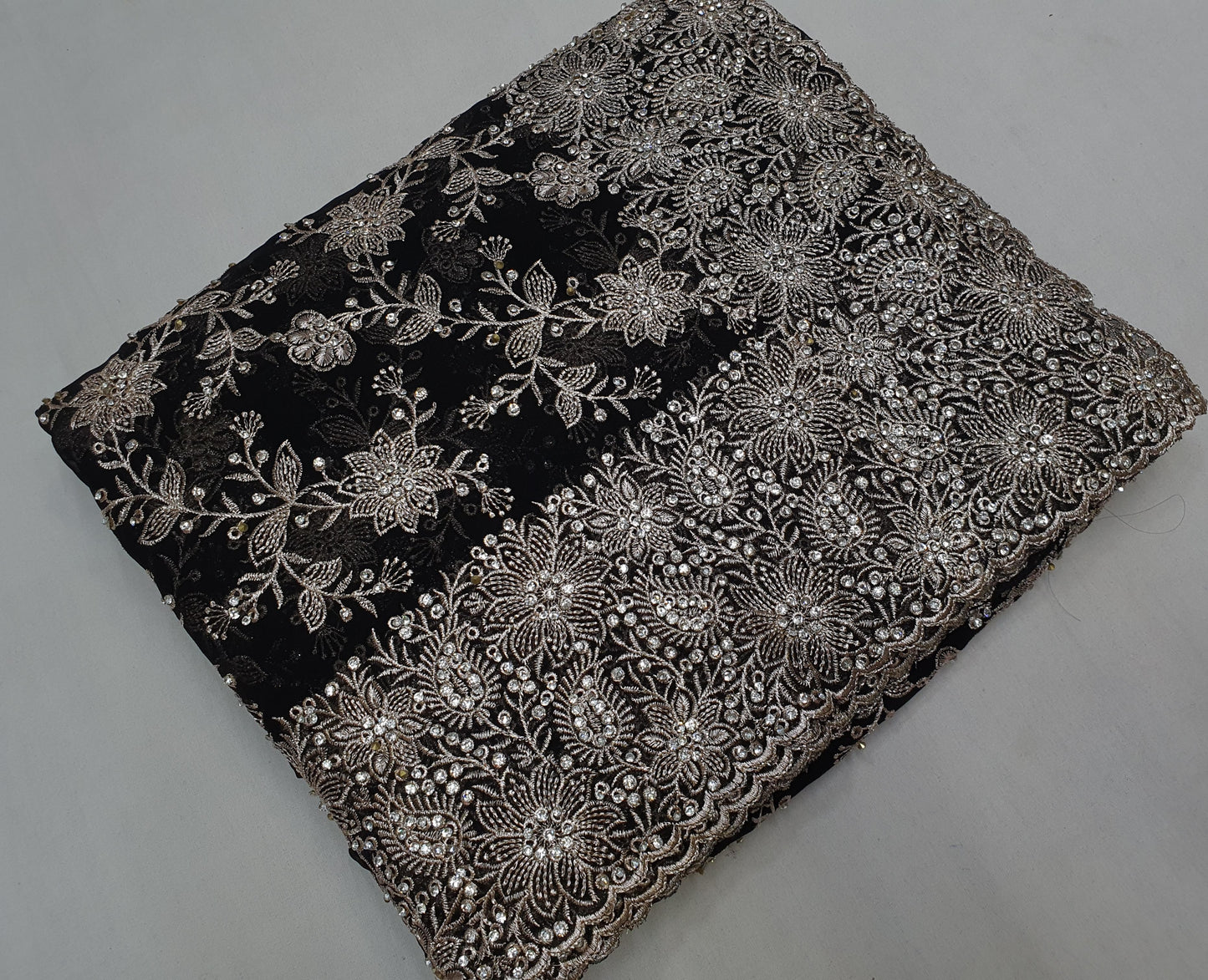 Allover silver jari jall with jarkan stone border on georgette* Saree