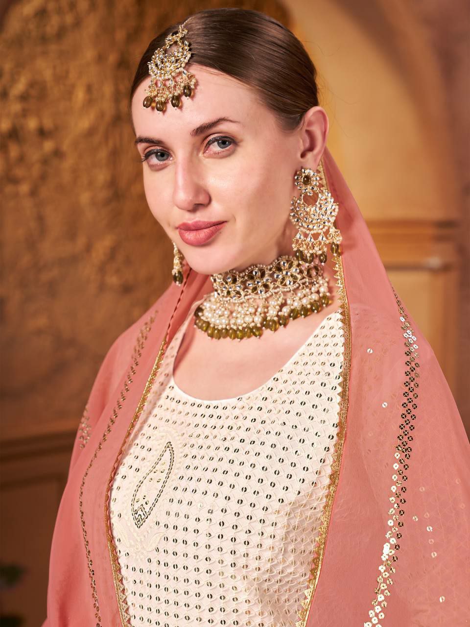 Beautiful suits said perfect additional look
TOP FABRIC : HAVY FOUX GOARGATYE WITH HAVY EMBROIDERY WORK AND MOTI LACE WORK