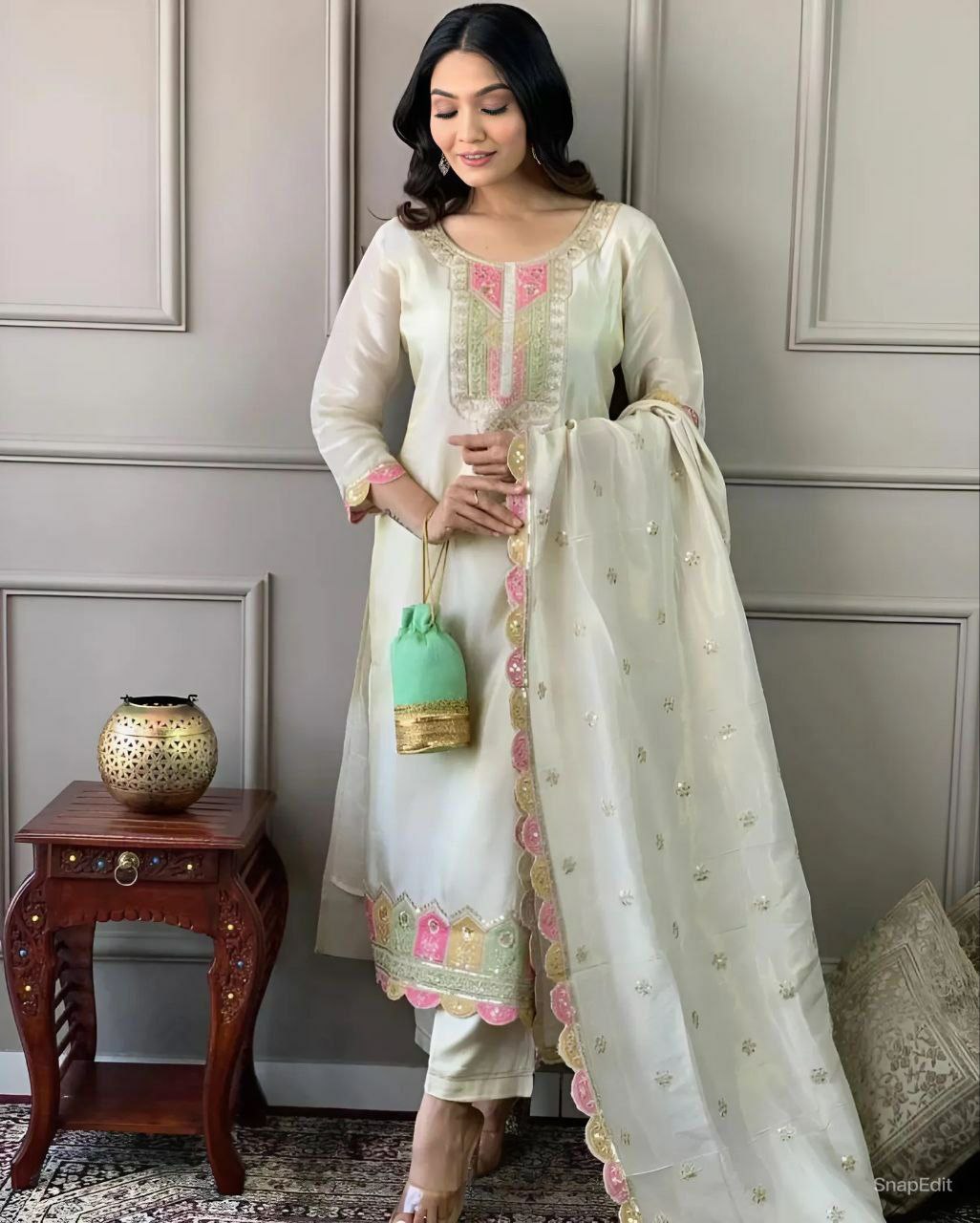 Suti set 
TOP FABRIC : VISCOSE CHANDERI WITH SEQUENCE CODING EMBROIDERY WORK