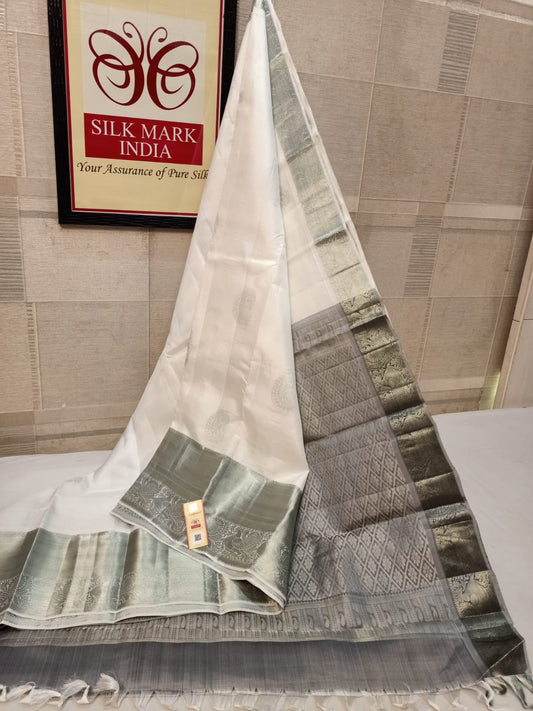 Pure kanjivaram silk Fancy Border
Both side Fancy Border Silver jarie weaving butta Double warp silk
Handloom weaving 
All over saree Silver jarie butta 
Silk mark certified pure silk kanjivaram silk
Double warp silk