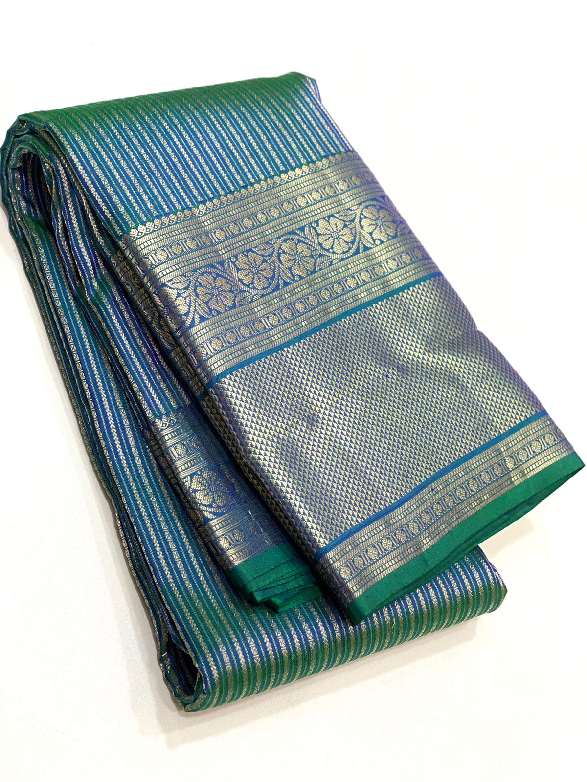 Pure Kanchivaram handloom silk saree with pure 2g zari traditional long border strip butta all over saree 
Silkmark certified