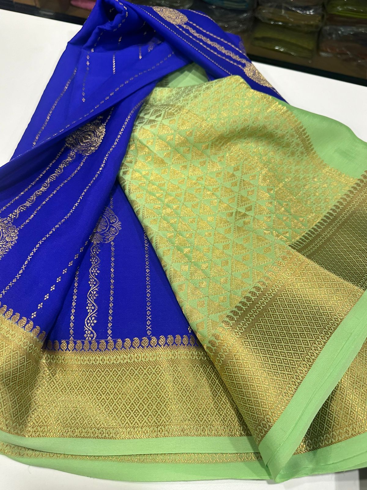 Pure Mysore silk sarees
120 grm thickness  with rich pallu 
Silk mark certified
Big Bentex border with motifs on the body n vertical lines   .....small motifs all over body with rich pallu