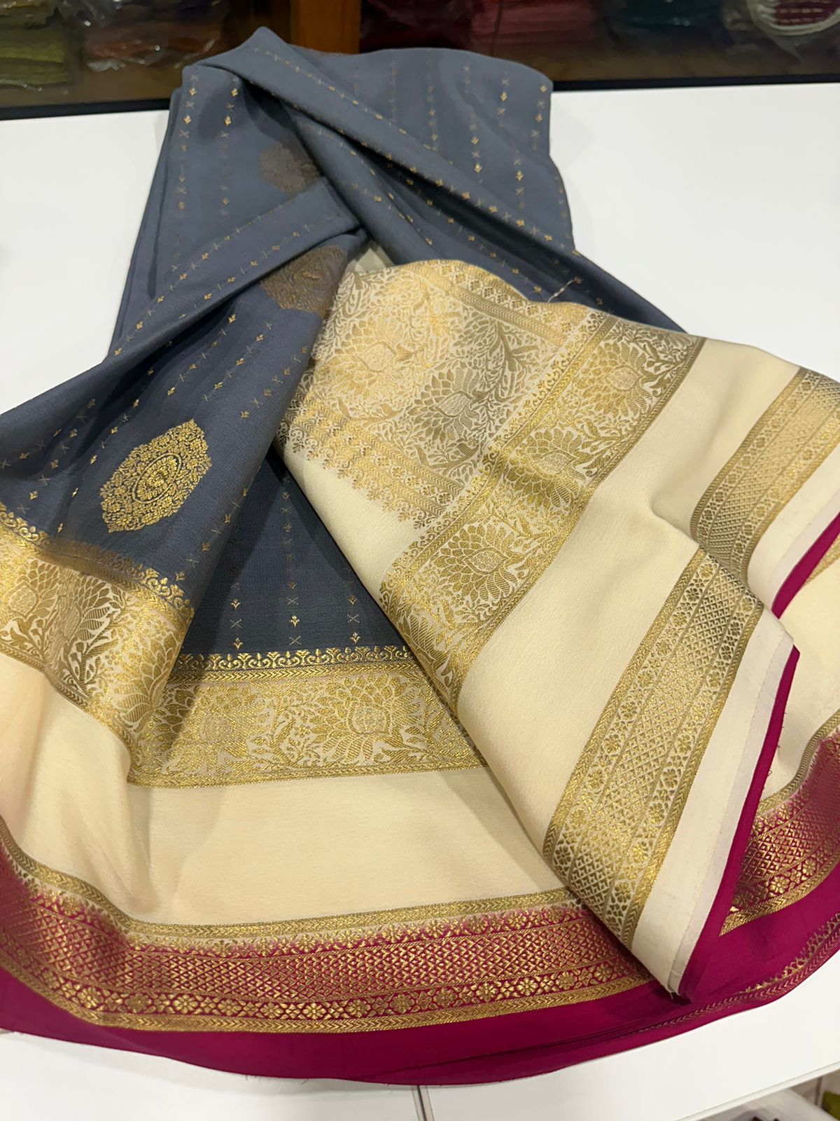 Pure Mysore silk sarees
120 grm thickness  with rich pallu 
Silk mark certified
Big Bentex border with motifs on the body n vertical lines   .....small motifs all over body with rich pallu