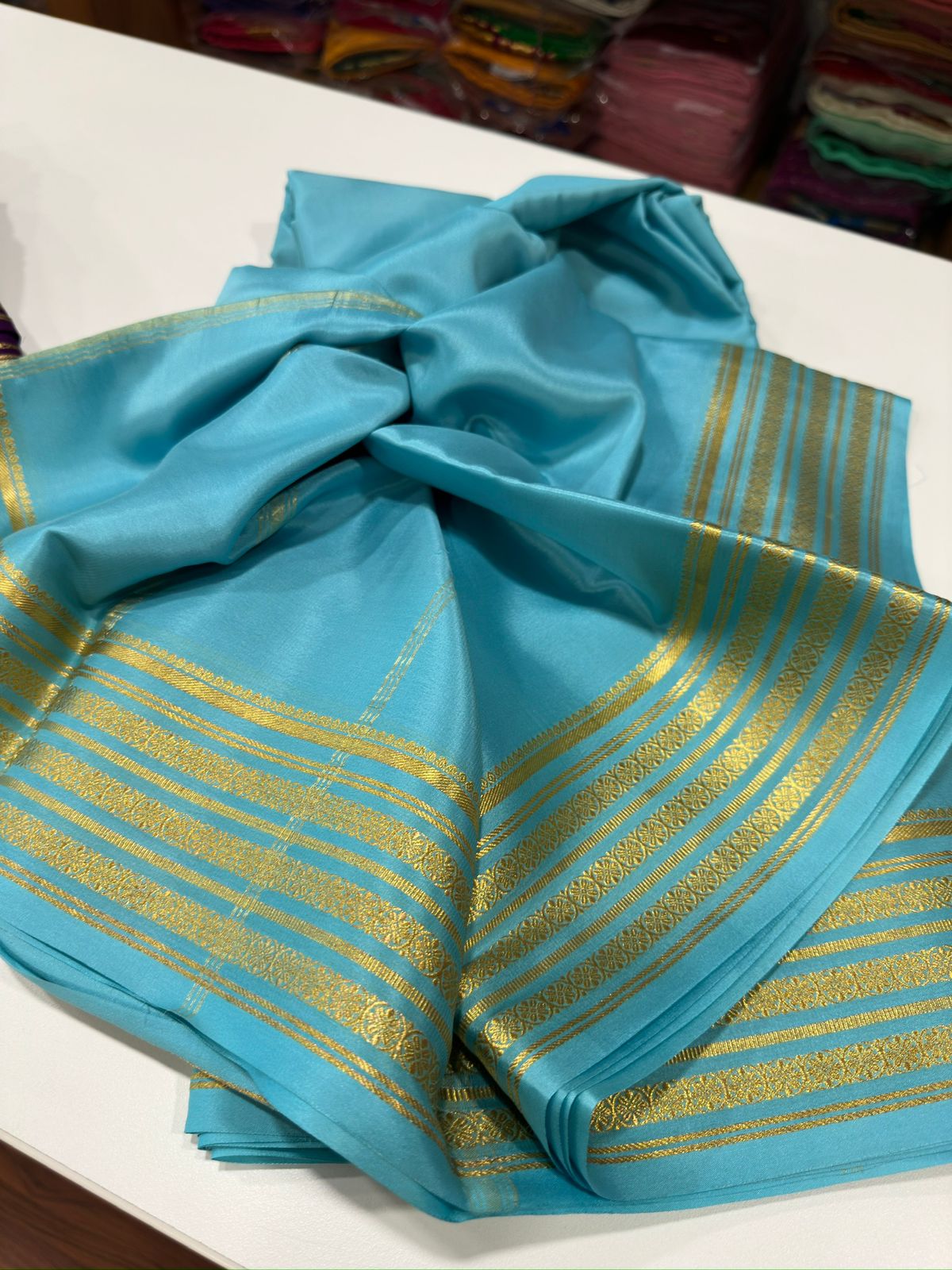 Pure Mysore silk sarees
110 grm thickness 
Silk mark certified.           Traditional border with beautiful Colors💙