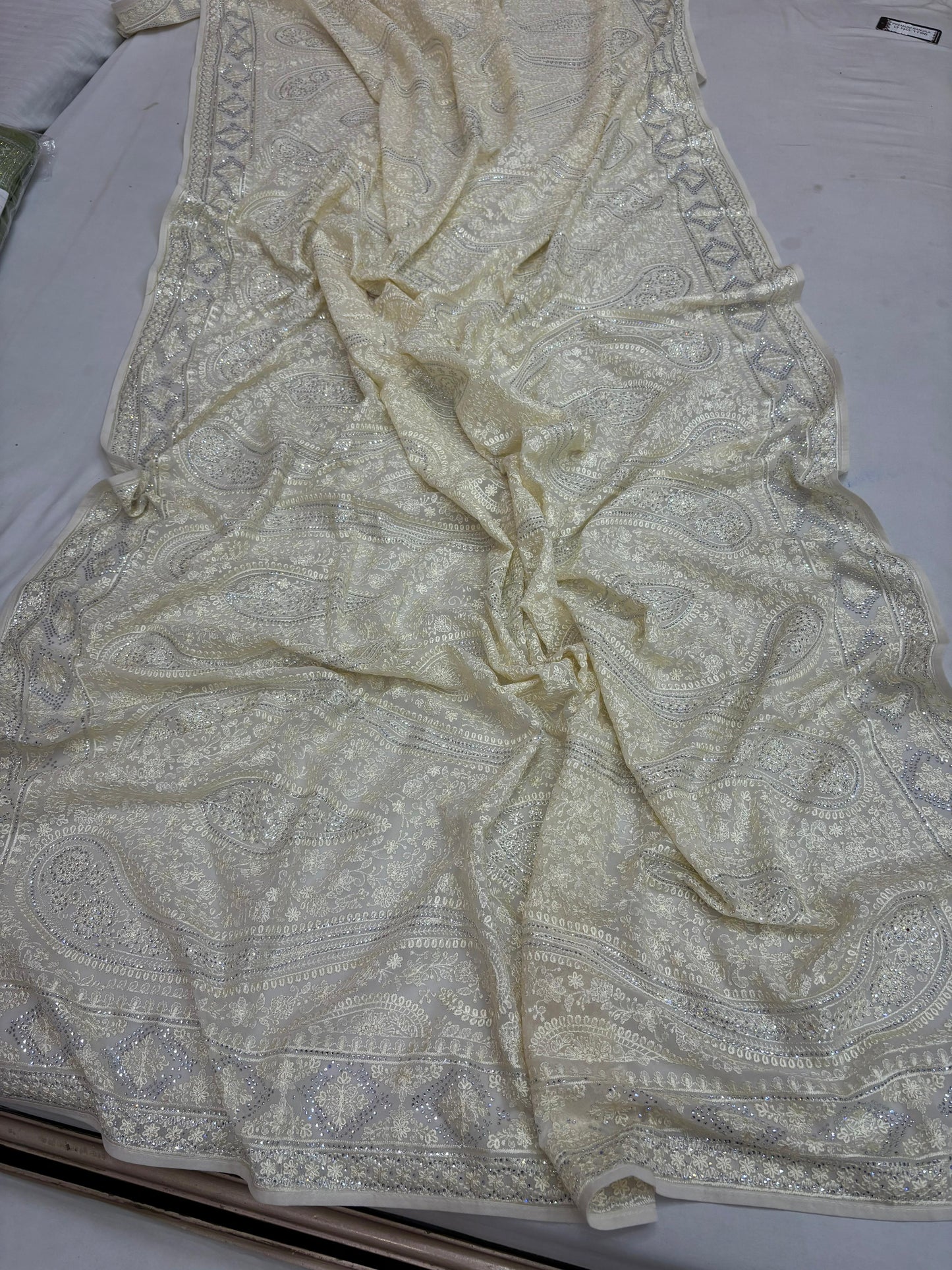 ALLOVER CODING REASHAM DESIGNER JALL AND BORDER WITH STONE ON PURE ORGANZA 
Saree