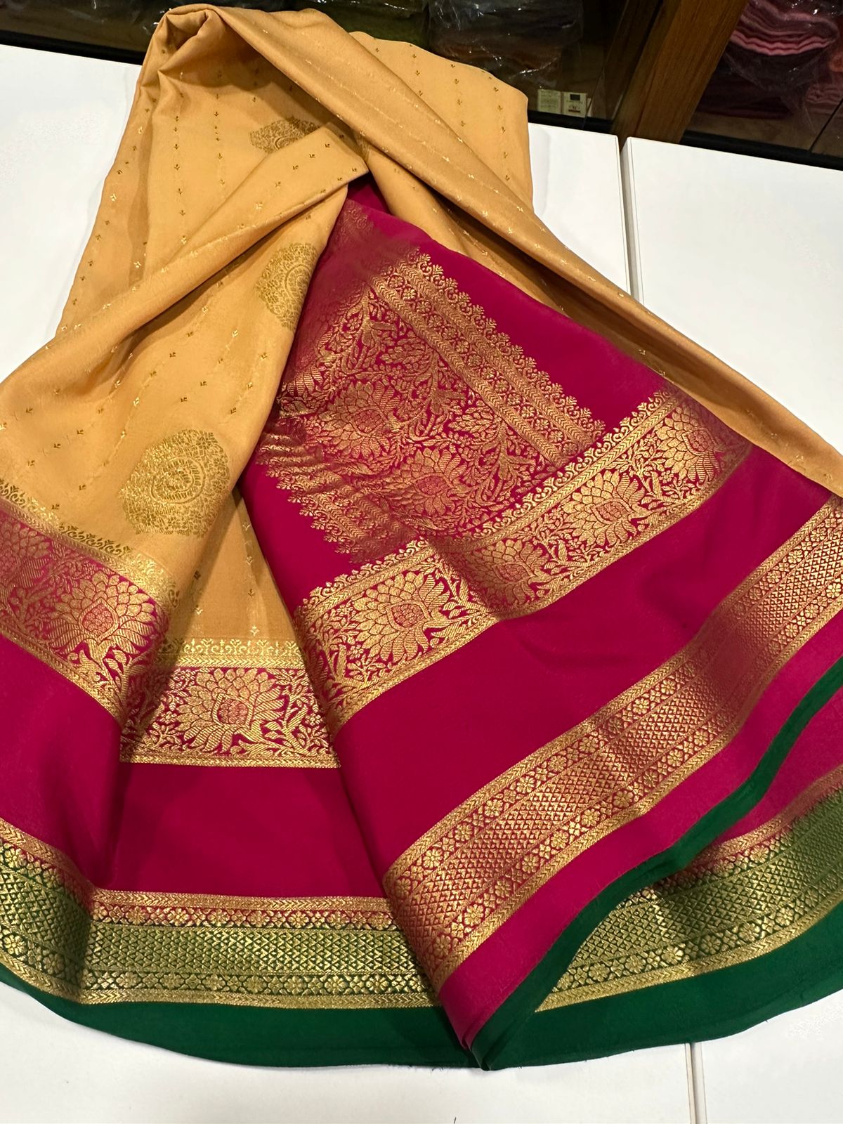 Pure Mysore silk sarees
120 grm thickness  with rich pallu 
Silk mark certified
Big Bentex border with motifs on the body n vertical lines   .....small motifs all over body with rich pallu