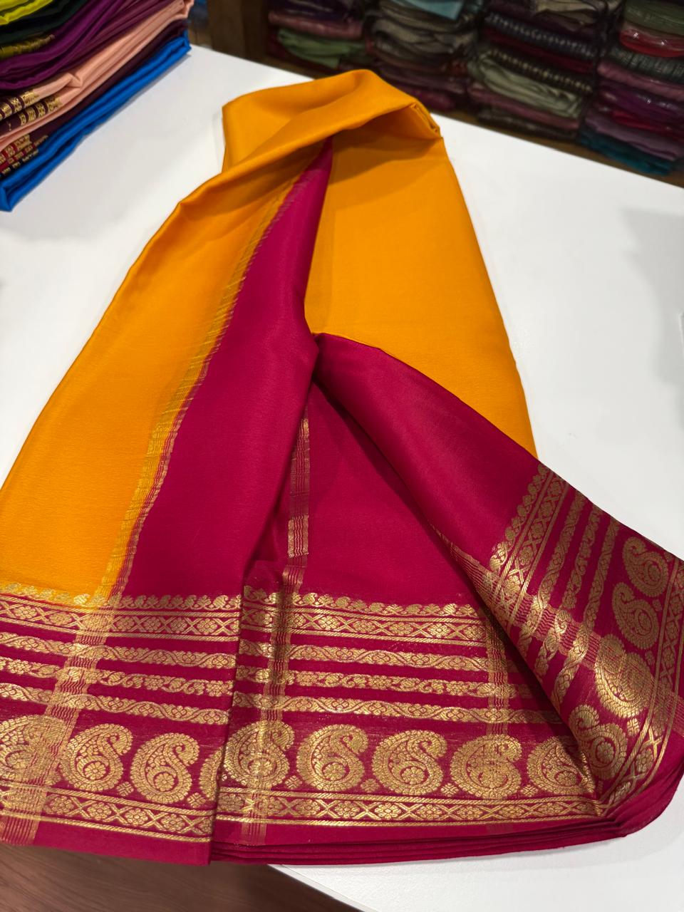 Pure Mysore silk sarees 
75 grm thickness Traditional  border Mysore silk sarees with all beautiful self colour big mango traditional