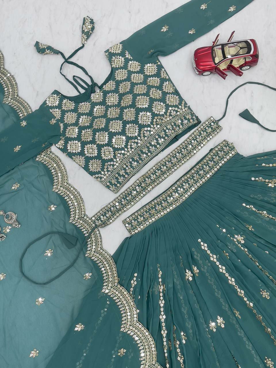 Perfect functions Lengha Choli
Fabric: Fox Georgette 
Work:-Heavy 7mm Sequence Work