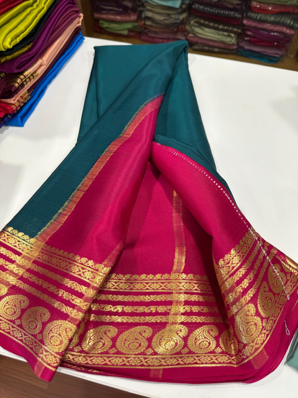 Pure Mysore silk sarees 
75 grm thickness Traditional  border Mysore silk sarees with all beautiful self colour big mango traditional