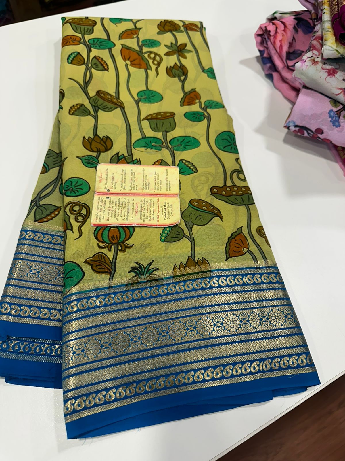 Pure Mysore silk saree
Silk mark certification 
75  grm  thickness 
Comes with contrast  blouse piece 
digital prints Printed Mysore silk sarees with heavy quality