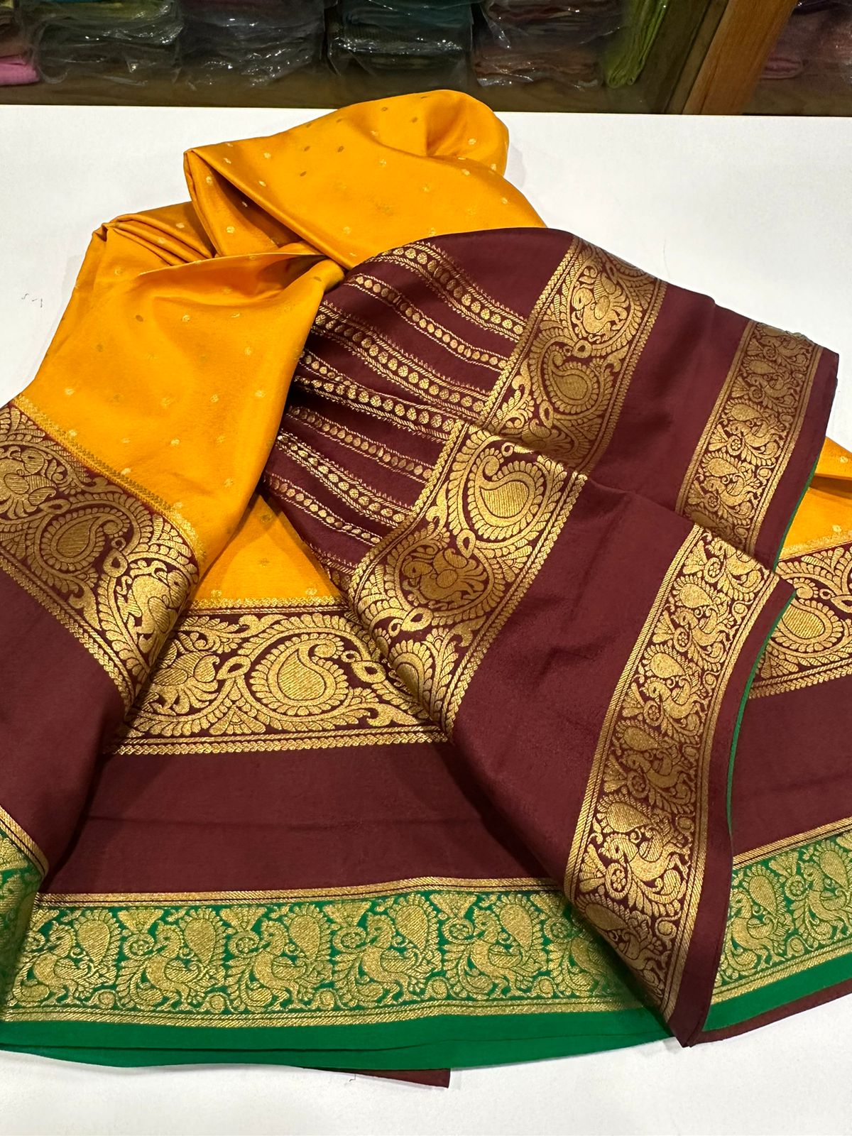 Pure Mysore silk sarees
120 grm thickness  with rich pallu 
Silk mark certified
Big mango n peacock design on border