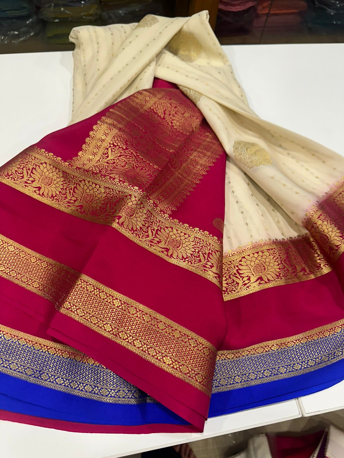 Pure Mysore silk sarees
120 grm thickness  with rich pallu 
Silk mark certified
Big Bentex border with motifs on the body n vertical lines   .....small motifs all over body with rich pallu