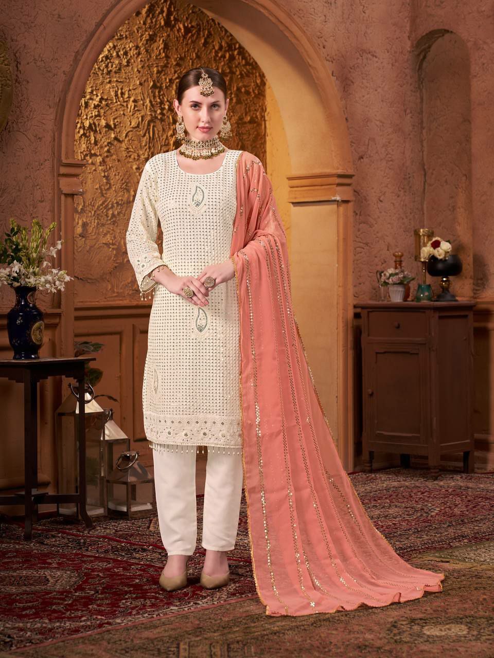 Beautiful suits said perfect additional look
TOP FABRIC : HAVY FOUX GOARGATYE WITH HAVY EMBROIDERY WORK AND MOTI LACE WORK