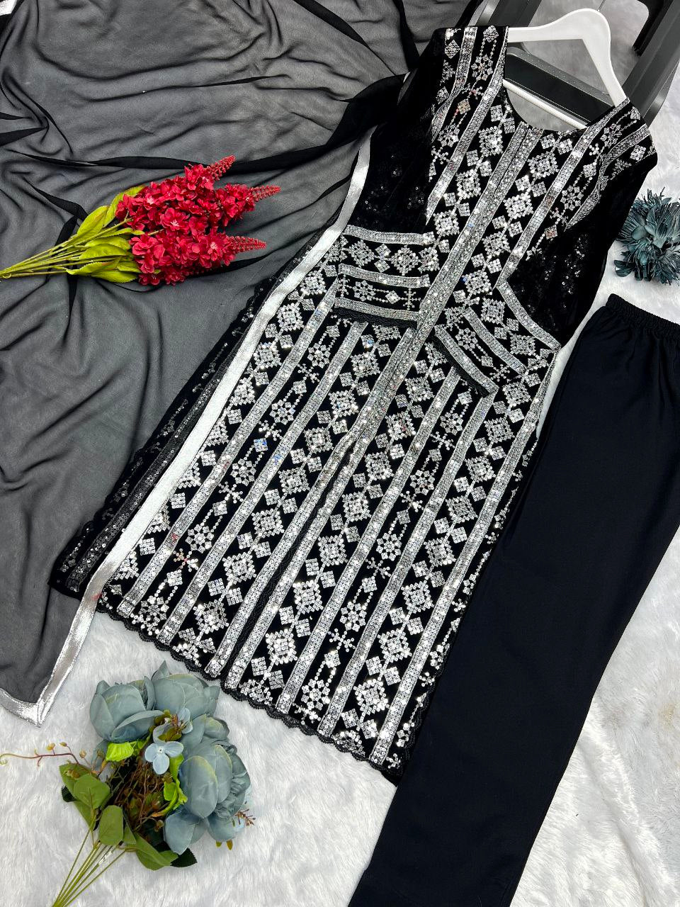Designer suit set
FABRICE:-Heavy faux georgette 
WORK - Fancy Embroidery 5mmSequence Work with fancy GPO lace border 
SLEEVE :- Full Sleeve With embroidery 5mm sequence Work with fancy GPO lace border 
INNER :- Micro Cotton