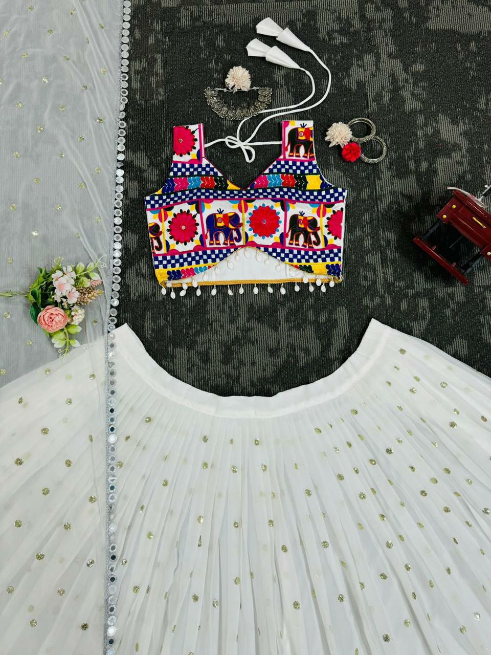 Perfect ring ceremony lehenga choli set :                                   Foux gorgette 
Work : Sequnce with Chainstich work with *Real mirror