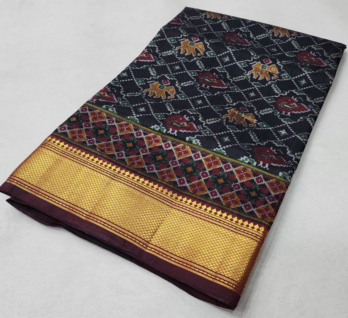 Sana silk Pochampalli print! 
Zari border! Saree