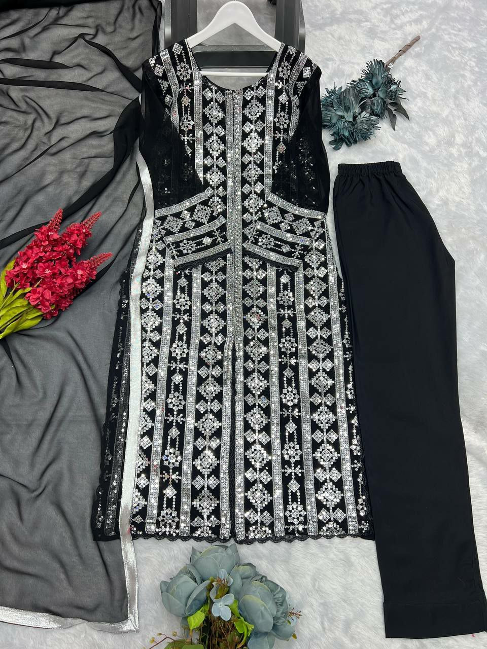 Designer suit set
FABRICE:-Heavy faux georgette 
WORK - Fancy Embroidery 5mmSequence Work with fancy GPO lace border 
SLEEVE :- Full Sleeve With embroidery 5mm sequence Work with fancy GPO lace border 
INNER :- Micro Cotton