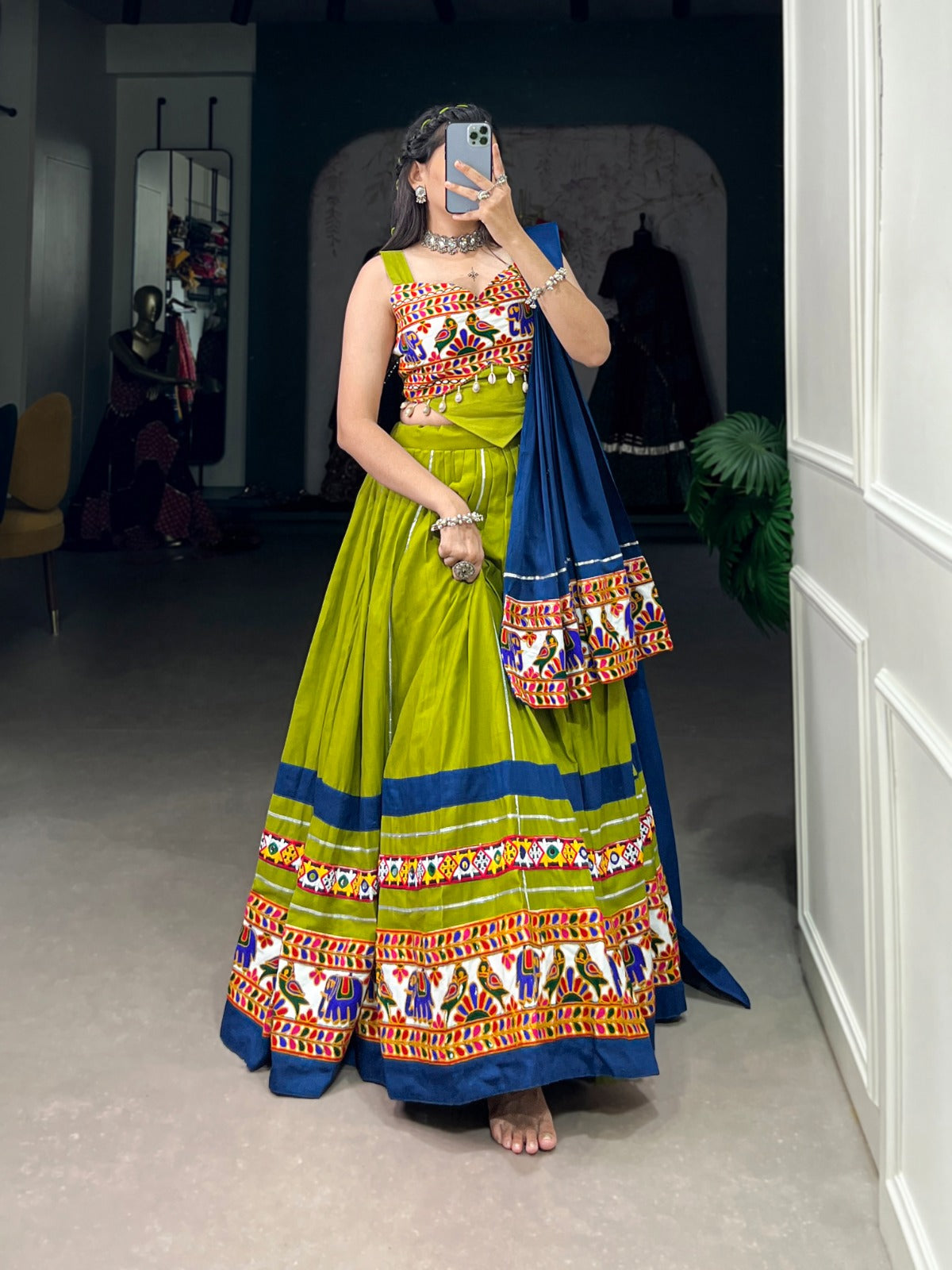 Navratri Collection 2024
Enchanting Navratri Fashion: Elegant Cotton Chaniya Choli with Authentic Gamthi Work and Gota Patti Touch-Ups for a Vibrant Celebration🦚🧿