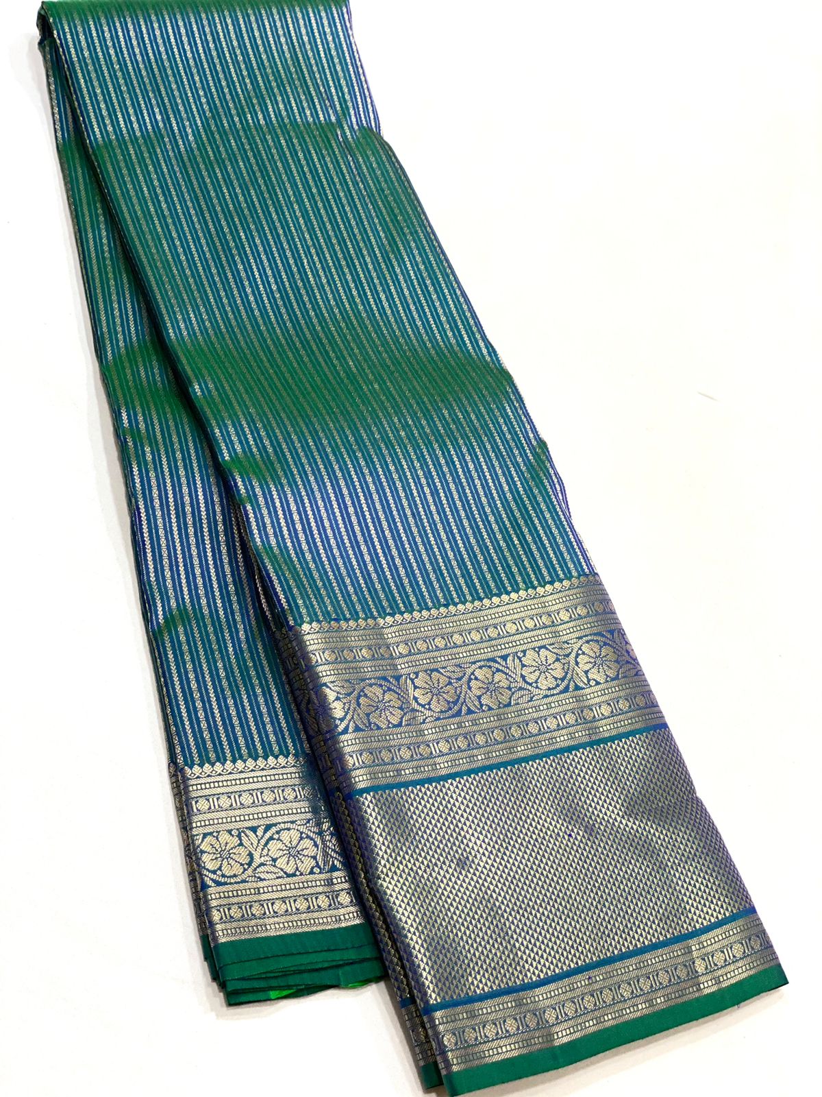 Pure Kanchivaram handloom silk saree with pure 2g zari traditional long border strip butta all over saree 
Silkmark certified