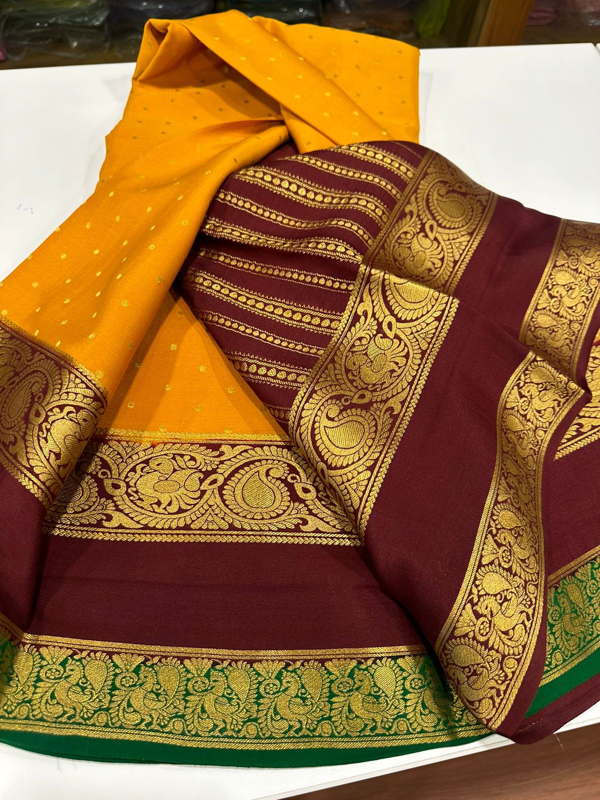Pure Mysore silk sarees
120 grm thickness  with rich pallu 
Silk mark certified
Big mango n peacock design on border