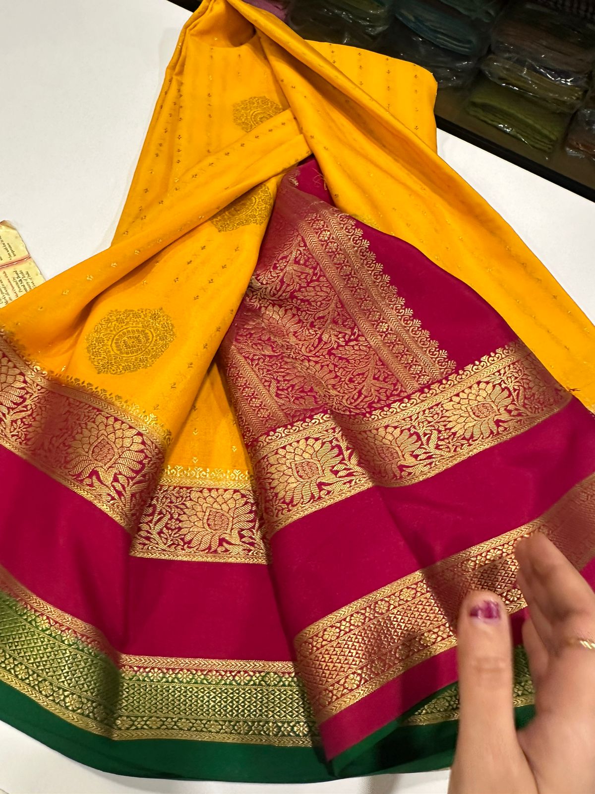 Pure Mysore silk sarees
120 grm thickness  with rich pallu 
Silk mark certified
Big Bentex border with motifs on the body n vertical lines   .....small motifs all over body with rich pallu