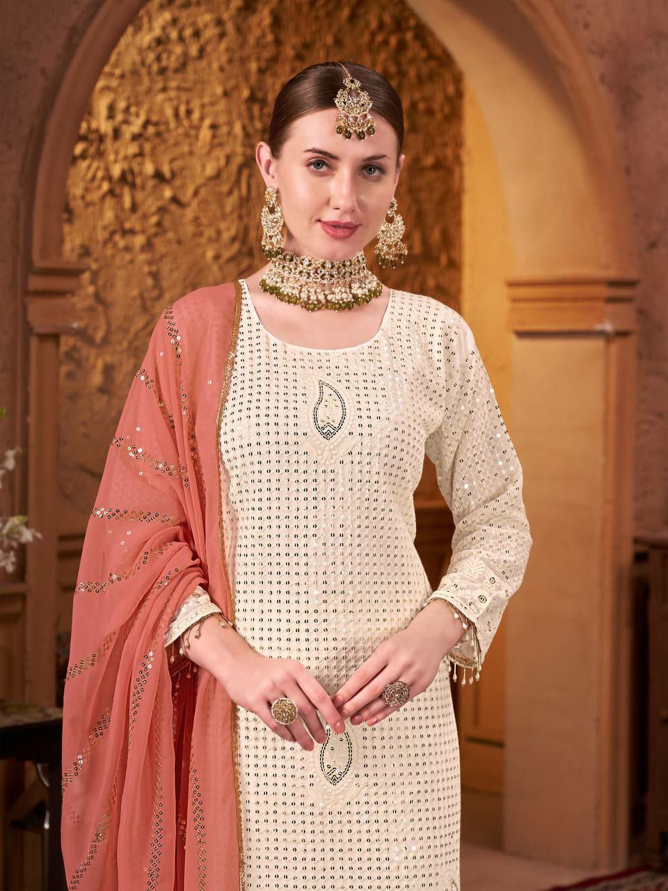 Beautiful suits said perfect additional look
TOP FABRIC : HAVY FOUX GOARGATYE WITH HAVY EMBROIDERY WORK AND MOTI LACE WORK