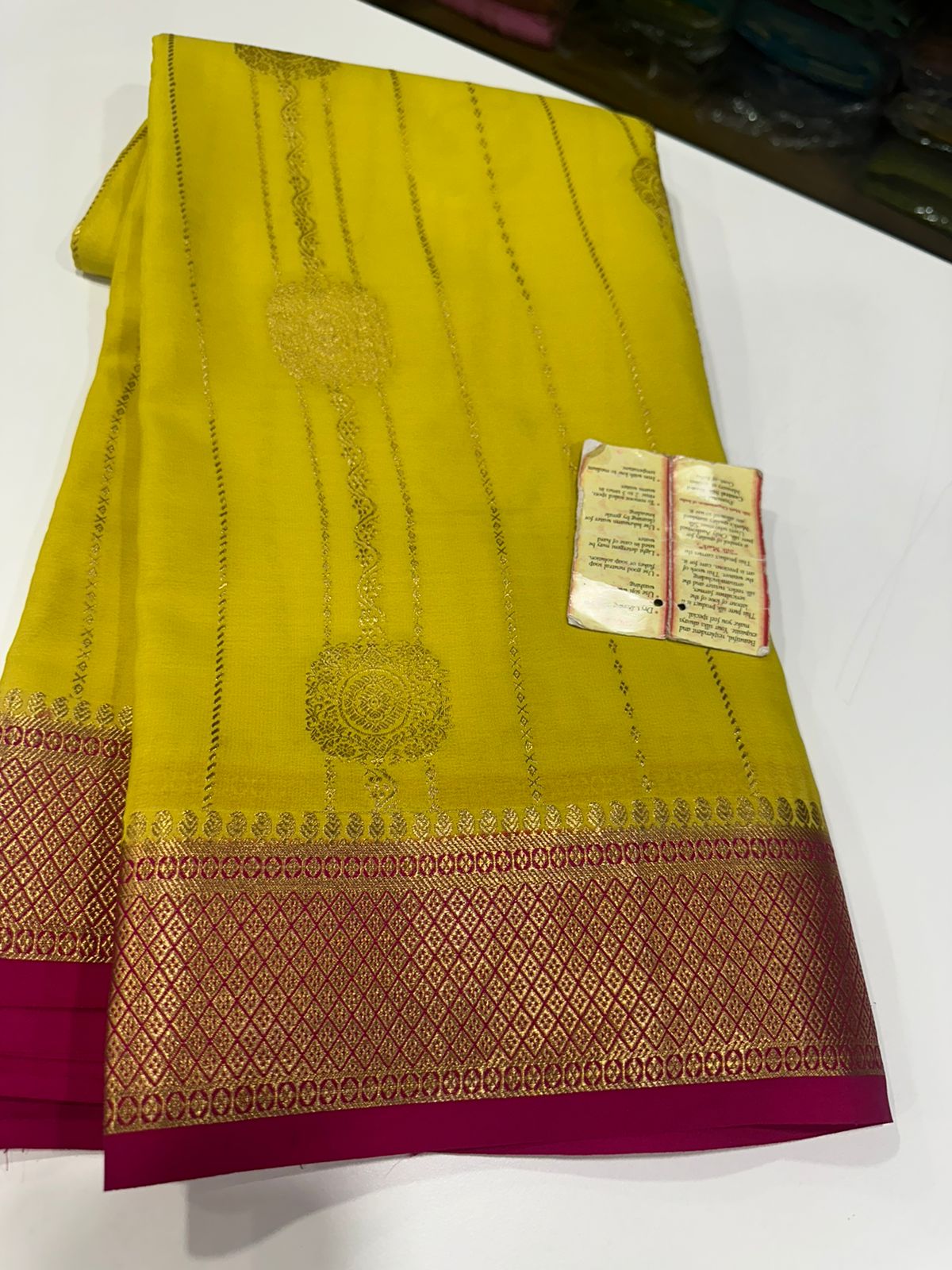 Pure Mysore silk sarees
120 grm thickness  with rich pallu 
Silk mark certified
Big Bentex border with motifs on the body n vertical lines   .....small motifs all over body with rich pallu
