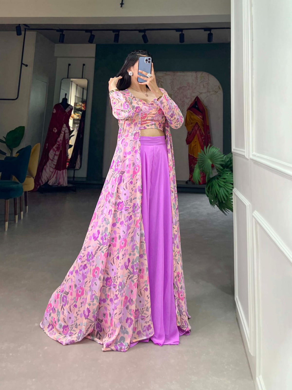 Plazo With Shrug
The intricate patterns of the floral print shrug cascade effortlessly over the flowing elegance of the palazzo💜
