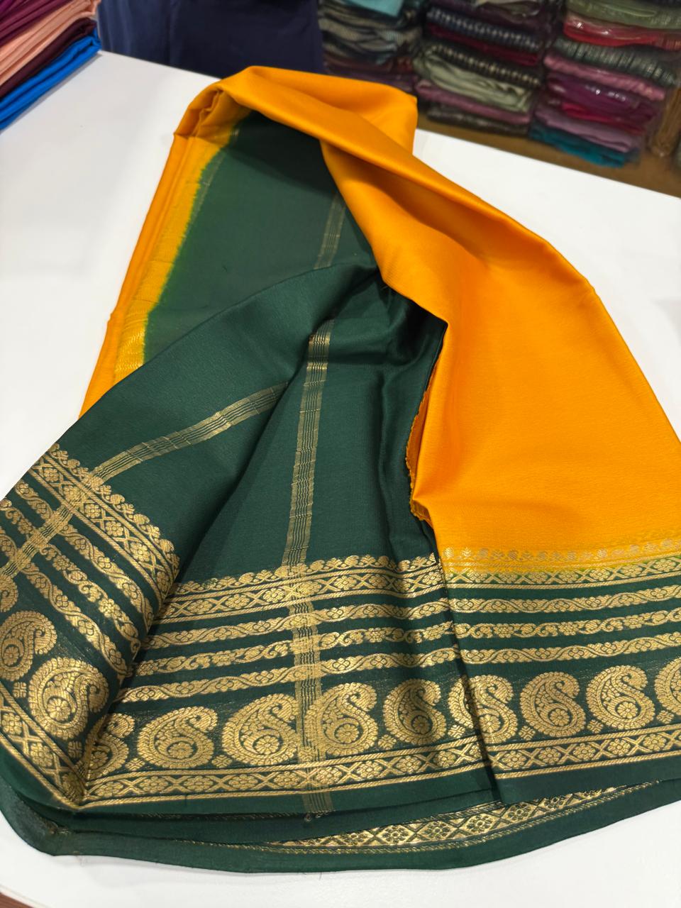 Pure Mysore silk sarees 
75 grm thickness Traditional  border Mysore silk sarees with all beautiful self colour big mango traditional