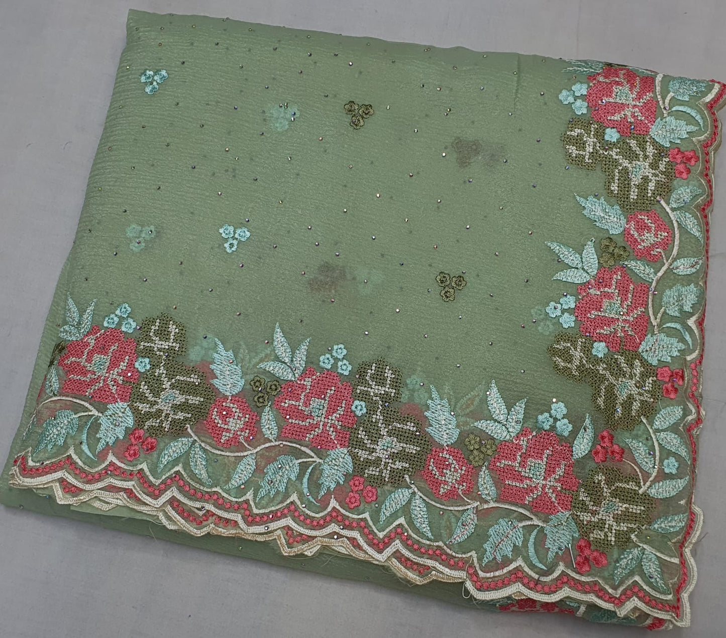 Allover crosstich work border and allover swaroski stone on crush chiffon* 
Saree
