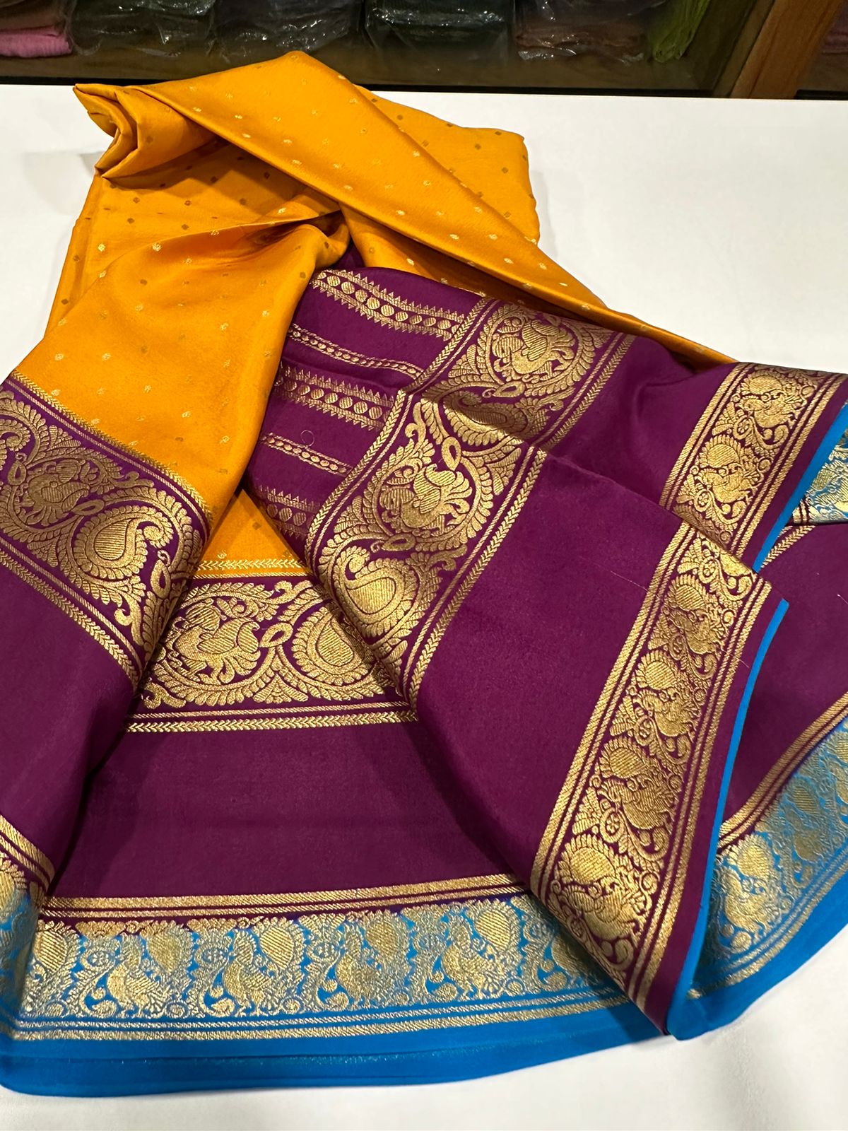 Pure Mysore silk sarees
120 grm thickness  with rich pallu 
Silk mark certified
Big mango n peacock design on border