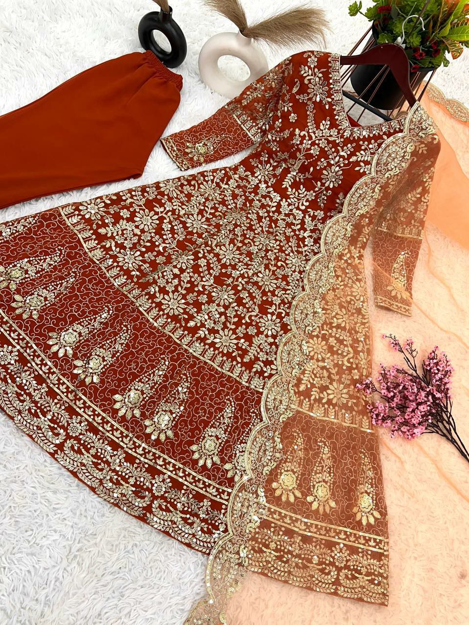 Designer gown set.                 Gown Fabric: Pure Heavy  Faux Georgette With Full Heavy Embroidery Sequence Work*    Full Sleeve
